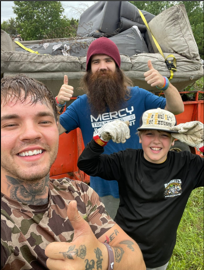 The Randall's Junk Removal team giving thumbs up on the job